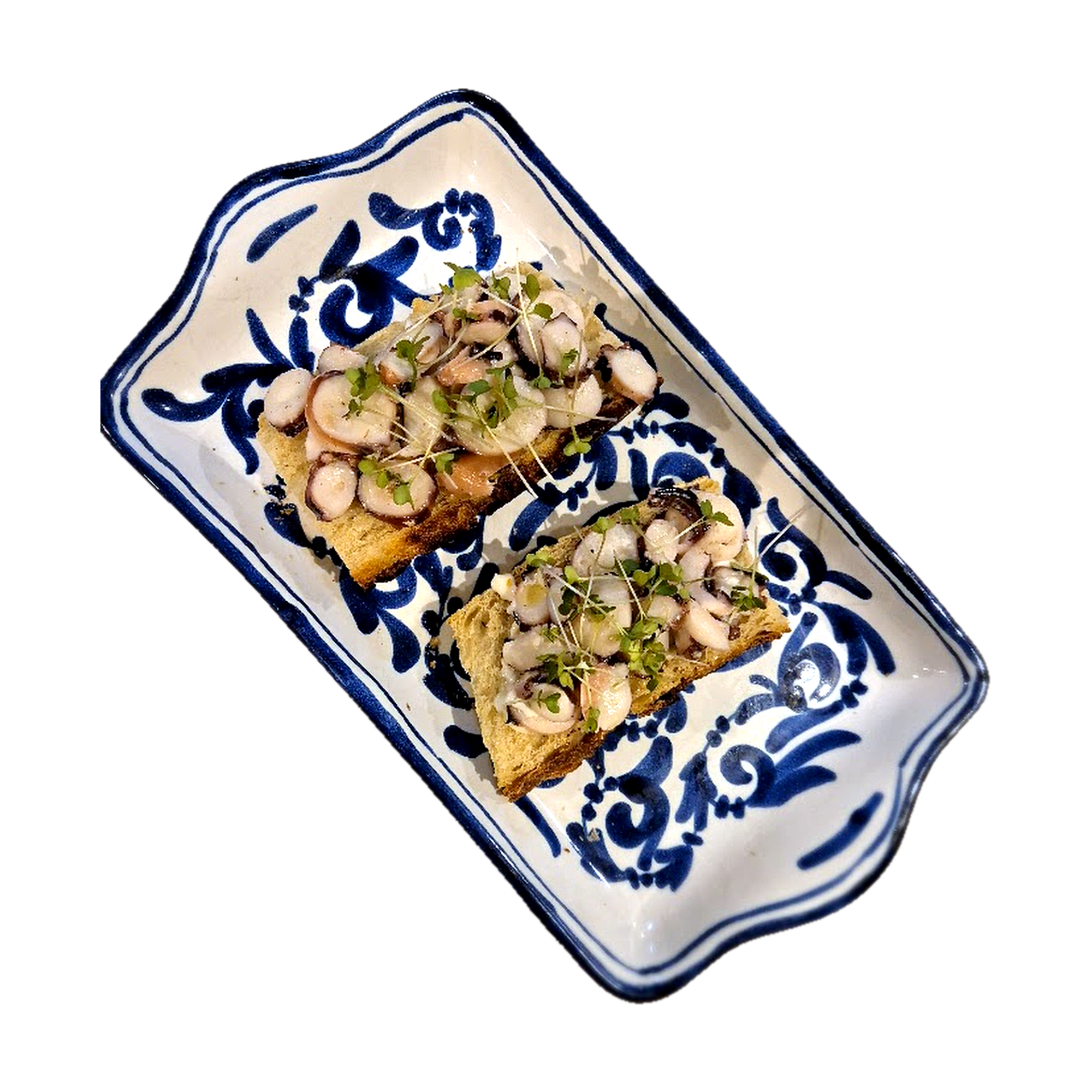 Tostadas con pulpo y microgreens frescos